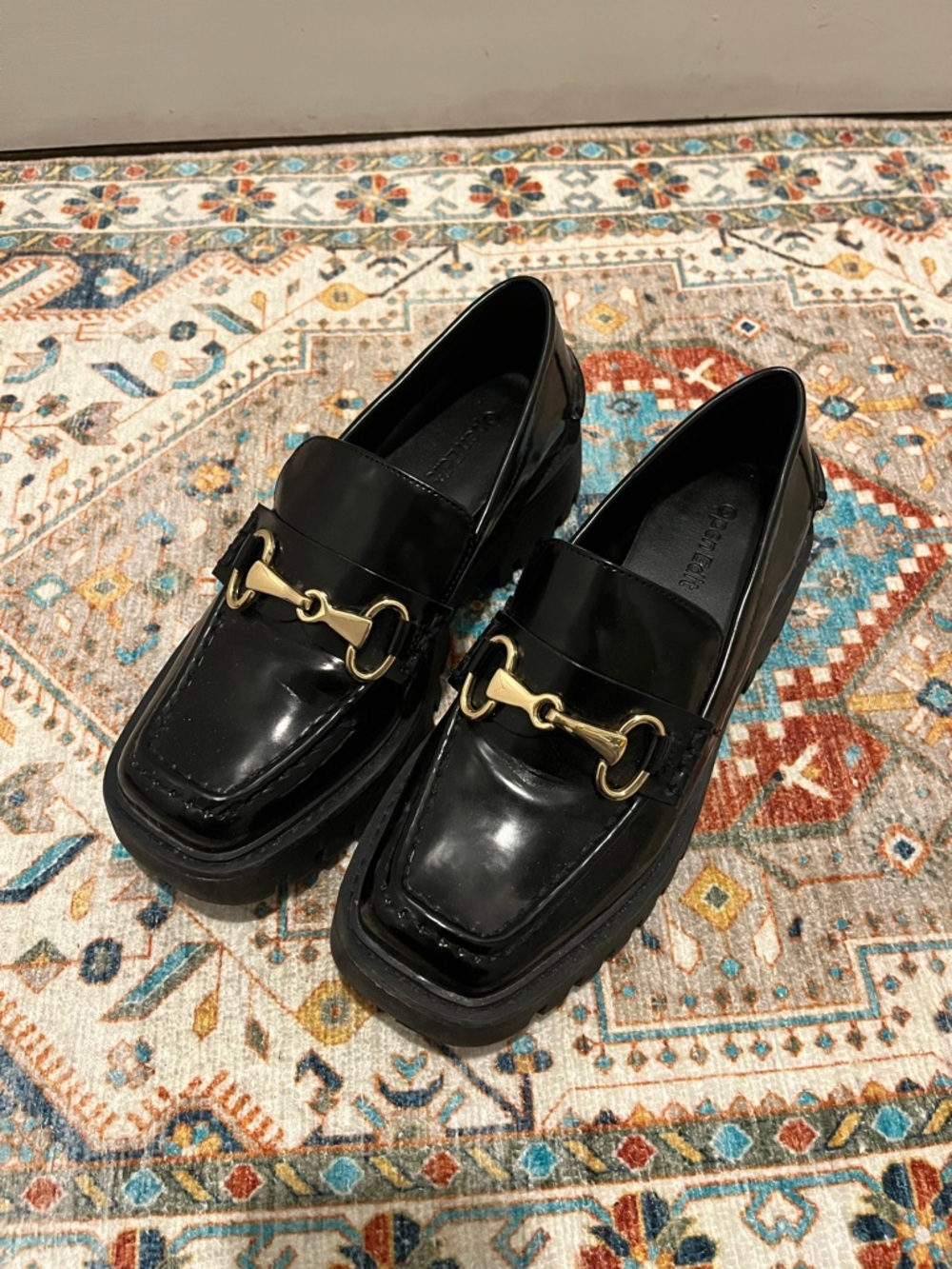 Black Patent Loafers with Gold Bit Accent